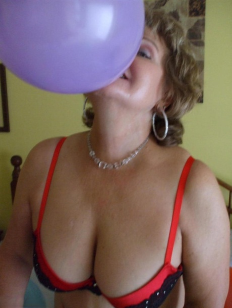 Older Lady Busty Bliss Plays With Balloons Before Uncupping Her Natural Tits
