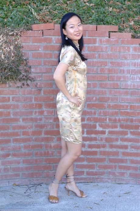 Asian First Timer Niya Yu Stands Naked After Disrobing Afore A Brick Wall