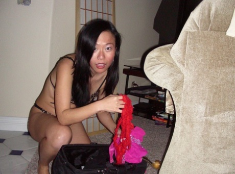 Following a sequence of candid snaps, Niya Yu, an amateur Asian, ends up completely naked.