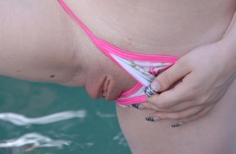 First Timer Ruby Flame Exposes Her Bald Slit Before Swimming In The Nude