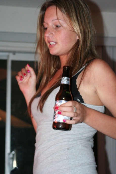 The big natural breasts of Sadie Sweet are set free by the drunken amateur in a solo act.