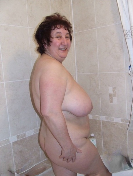 Fat Older Woman KinkyCarol Slips Off Her Robe Before Stepping Into Bubble Bath