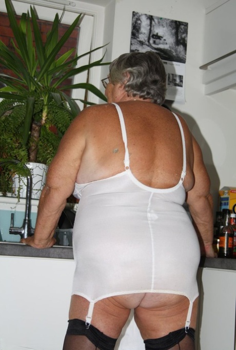 Fat British man Grandma Libby models varying sets of underthings at home