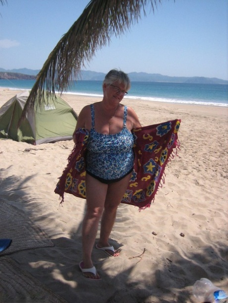 Fat grandmother Girdle Goddess takes off her swimsuit and poses in the nude at the ebachi slum.