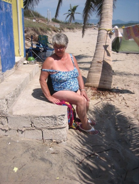 Fat granny Girdle Goddess is seen taking off her swimsuits and posing naked at the ebacha festival.