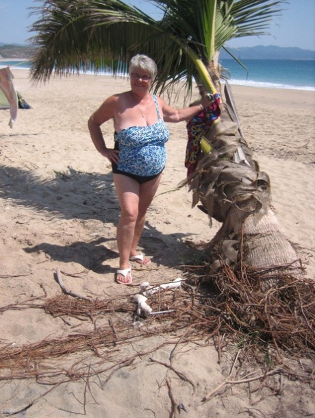 Dressed in revealing swimsuits, the Fat Granny Girdle Goddess takes to the water to pose for photos at the ebachi pond.