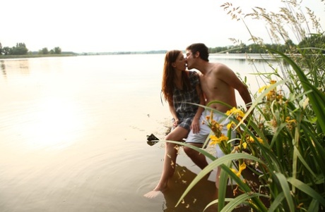 While engaging in sexual activity, the young couple come ashore.