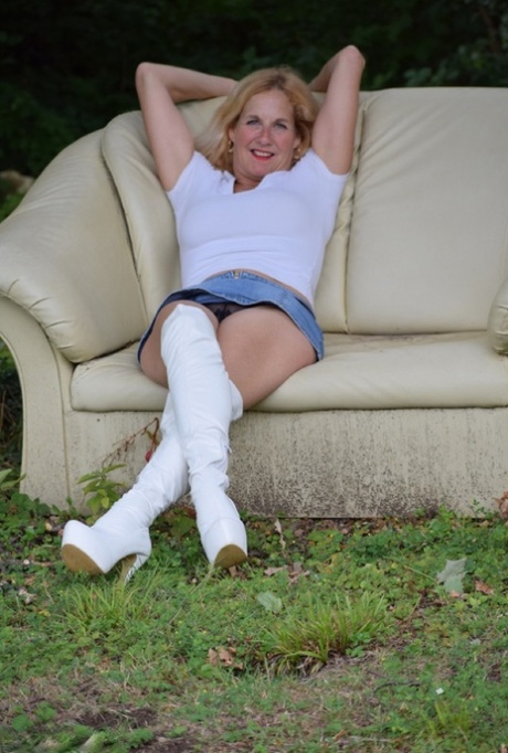 Amateur Model Molly MILF Shows Her Thighs In White OTK Boots And Skirt In Yard