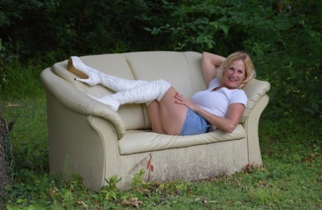 Amateur Model Molly MILF Shows Her Thighs In White OTK Boots And Skirt In Yard