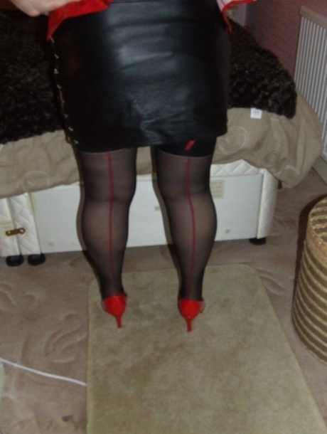 At present, Kinky Carol is an adult woman with short hair who removes her leather miniskirt.