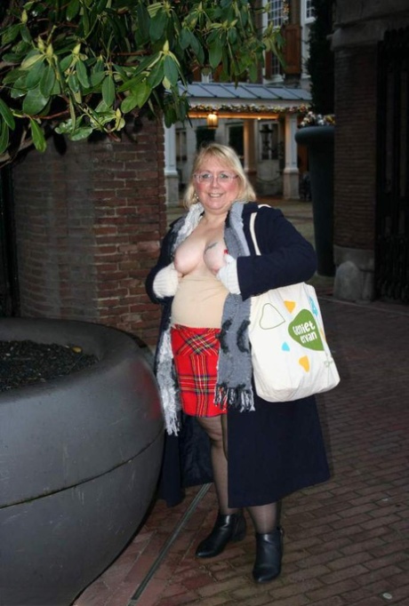 Exposed: Lexie Cummings, a fat blonde from the UK, takes to the streets in public before masturbating.