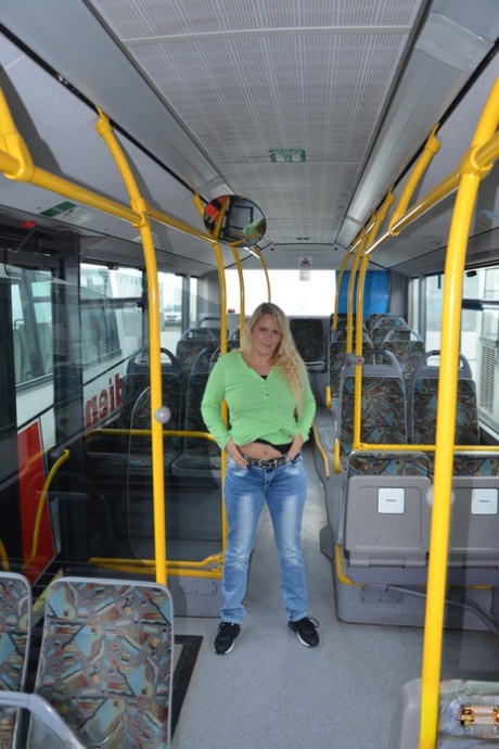 While riding on a public bus, the amateur blonde Sweet Susi strips herself while wearing her socks.