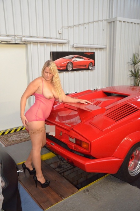 German MILF Sweet Susi Exposes Her Tits In Front Of A Lamborghini