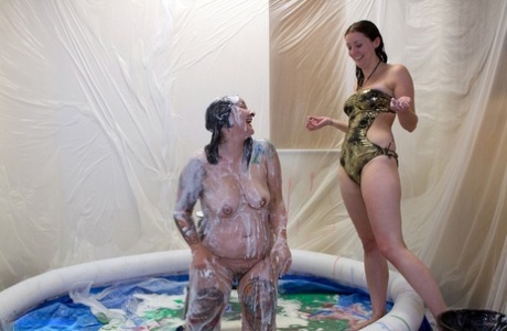 During swimming parties, amateur lesbians cover themselves with gunk.