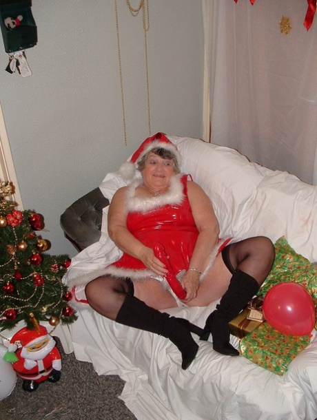 Obesity: Grandmother Libby enjoys spending time on a covered couch, sucking and cuddling with Santa.