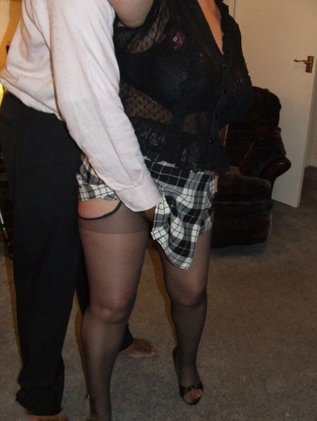 A black penis is performed by fat amateur Kinky Carol, who crawls on her knees.