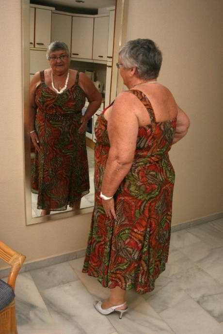Silver haired granny Grandma Libby exposes her obese figure afore a mirror #1