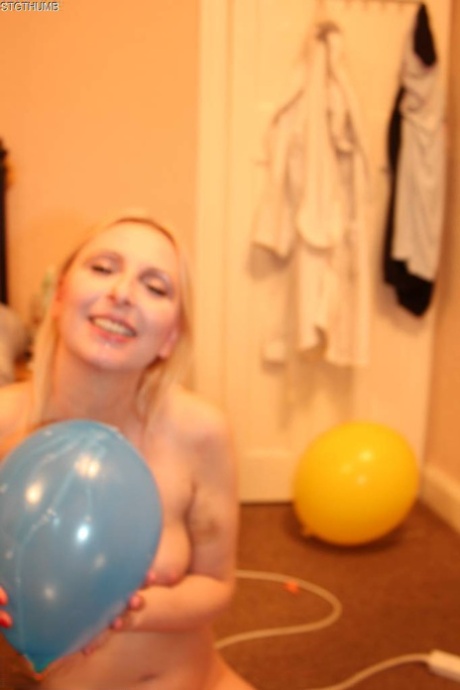 Tracey Lain, a young English woman with blonde hair, removes semen from an individual after engaging in sexual activity with it.