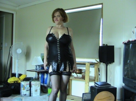 Amateur beauty Misha MILF sheds her sizeable natural hair to participate in leather lingerie.