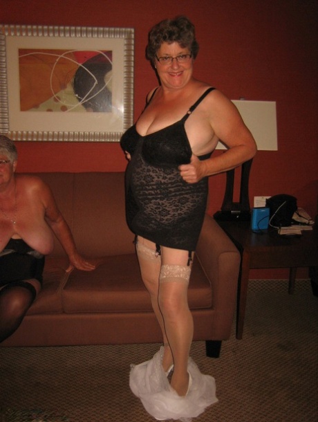 Short haired granny Girdle Goddess stripping to her stockings and high  heels - PornPics.com