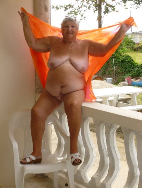 Banned by her mother, Grandma Libby is seen with her sunken body on a balcony.