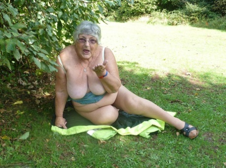 Exposed: Grandma Libby, pictured here, is seen flaunting her body by the side of an apple in a park.