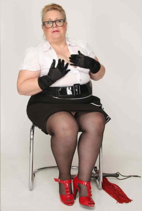 The pierced twat of Lexie Cummings, an Obese UK blonde, is displayed in gloves and nylons.