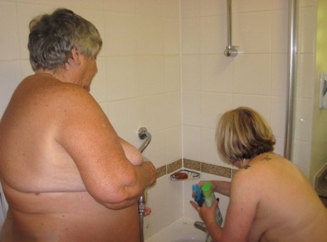 In the shower, Grandma Libby and her lesbian partner wash each other.