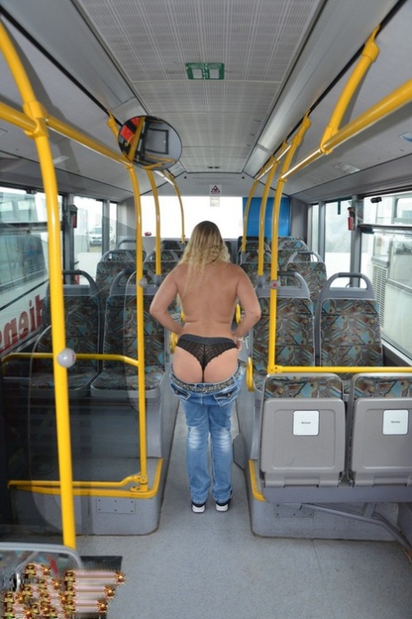 While riding on a city bus, a naked Sweet Susi enthusiast strips and socks to create a black look.