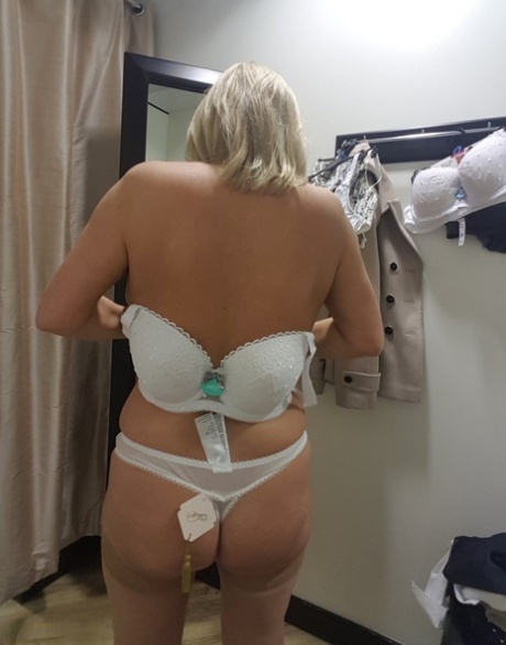 Chubby mature wife Lorna Blu changes form white to red to black sexy lingerie