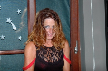 She puts on a flirtatious outfit of her own by wearing a sequin skirt and nylon stockings as an uncultured housewife.