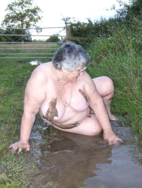 Grandma Libby, who is fat, dips into a mud trap and then covers herself.