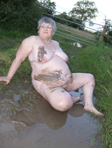 Upon entering the water, Grandma Libby (an obese monkey) dips into a pool of mud before sinking her body in mud.