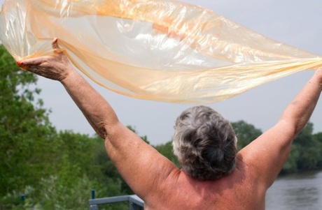Obese Oma Grandma Libby Doffs A See-through Raincoat To Get Naked On A Bridge