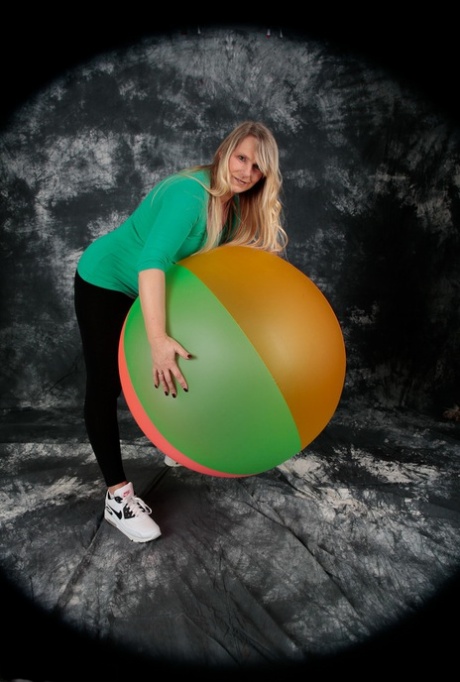 Sweet Susi, an amateur who is blonde, goes completely naked on a bouncy ball.