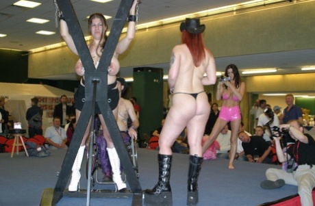 A British amateur, Denise Davies, is strapped into bondage equipment at a sexual club.