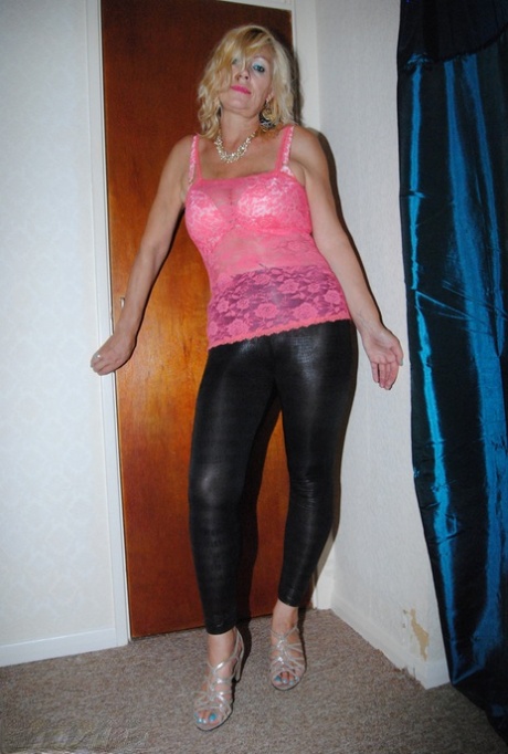 Over 30 amateur Platinum Blonde removes leather pants during a SFW event.