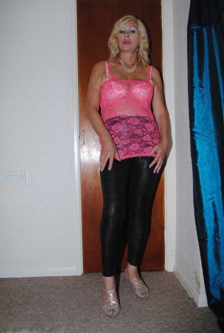 More than 30 amateur Platinum Blonde removes her leather trousers during a SFW performance.