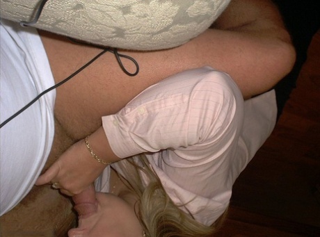 Momma, a Blonde amateur in his late 30s, is handcuffed and tied up with his pants after performing a blowjob.