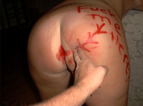 The naked Gangbang Momma, a blonde who was an amateur in the early 1970s, is seen with his hands tied back and necked after performing oral sex on her.