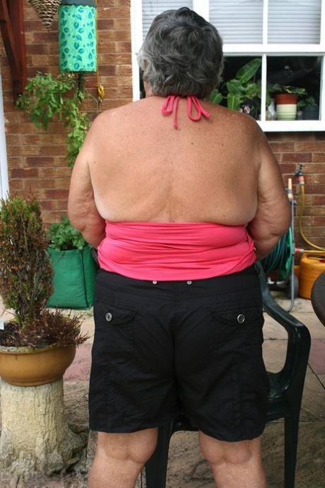 A patio is where Grandma Libby, the fat cat, willfully kiss her lower body before baring it on.