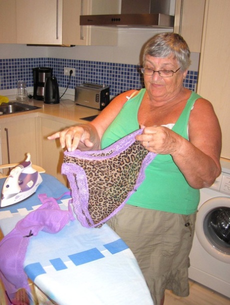 The boobs of overweight British woman, Grandma Libby, are revealed as she irons her chest.