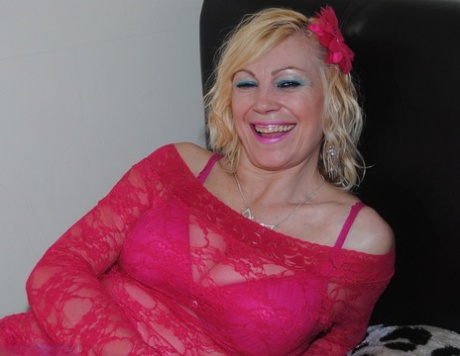 Mature Sexy Platinum Blonde Pulls Down Red Lace Dress To Expose Big Saggy Tits