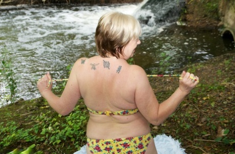 Thick Mature Woman Speedybee Strips Naked On A Blanket Down By The River
