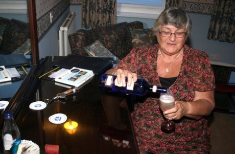 Prior to vaginal intercourse, Grandma Libby from the UK consumes a bottle of alcohol.