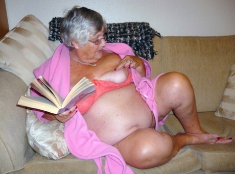 The grandmother of Grandma Libby in the UK who is deceased engages in masturbation while reading a romance novel.