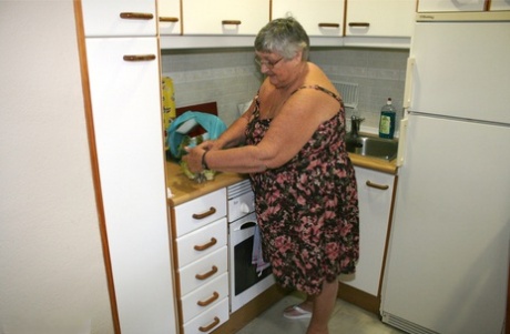 Obese grandmother Libby gets completely nude while playing with veggies in her home town of Cornwall, the UK.