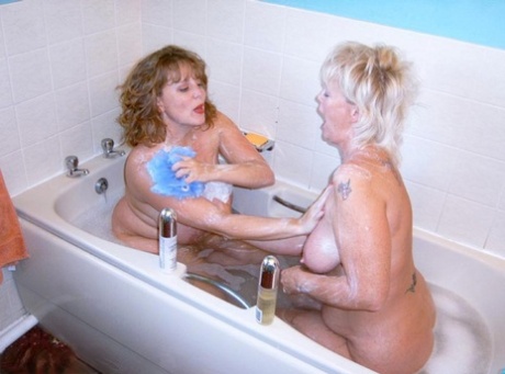 A British lesbian named Claire and her partner gave off their robes before taking an evening bath.