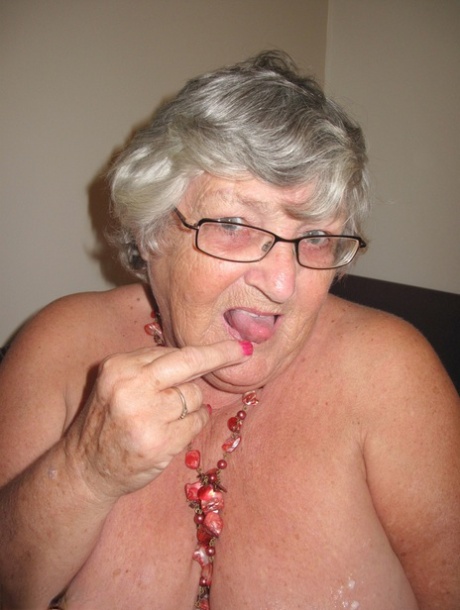 In the face of a large man, Grandmama Libby from Britain exposes herself on a balcony and gets nude.