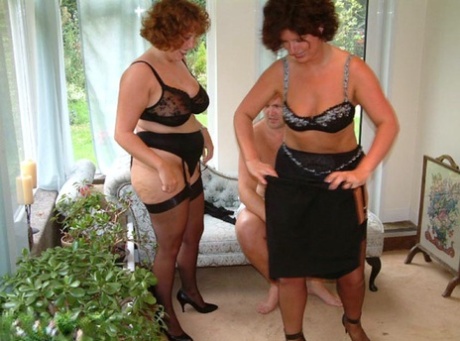 UK woman Curvy Claire and a GF strip to their underthings afore a man